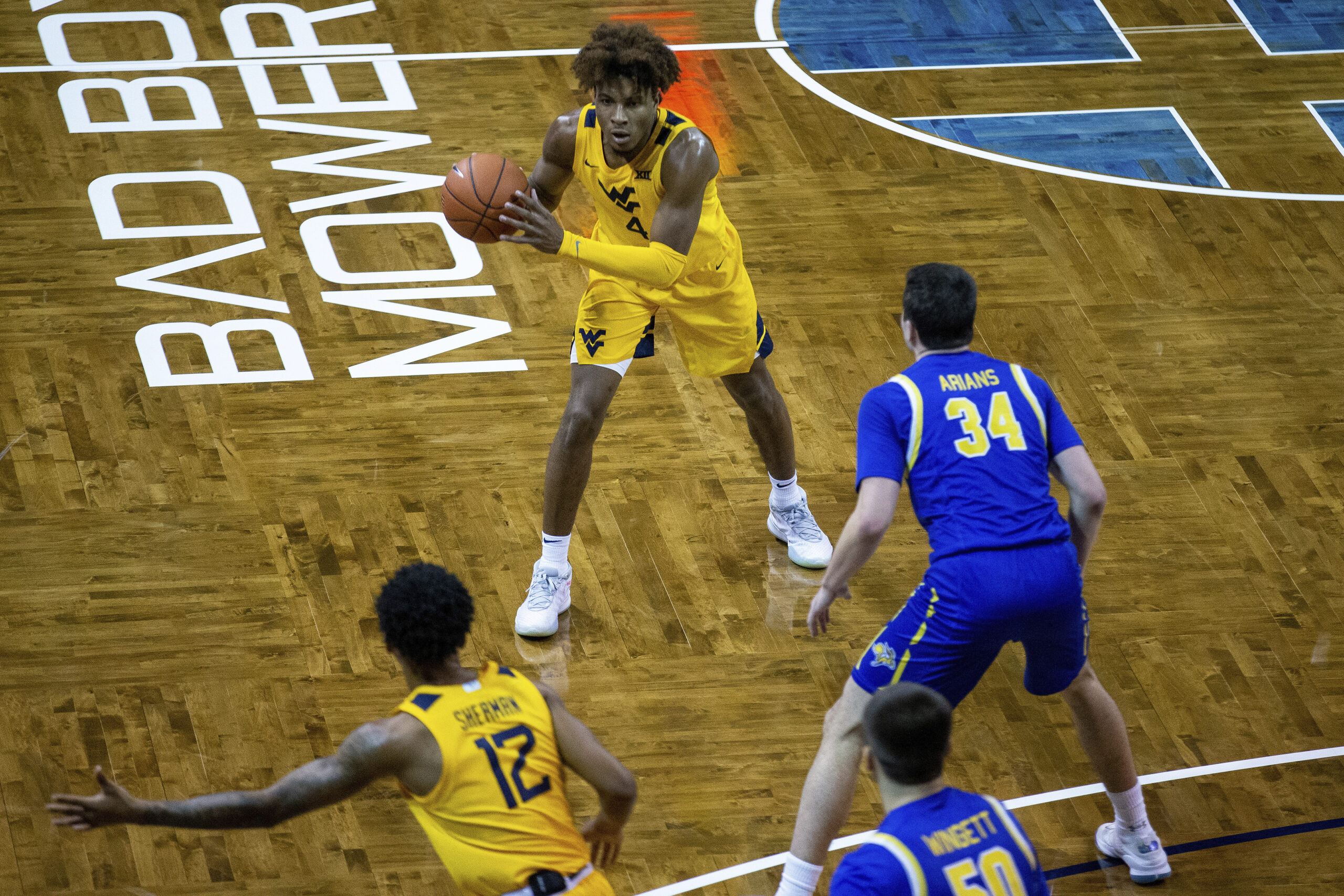 Deuce McBride gets the call and leads No. 15 West Virginia past South Dakota State